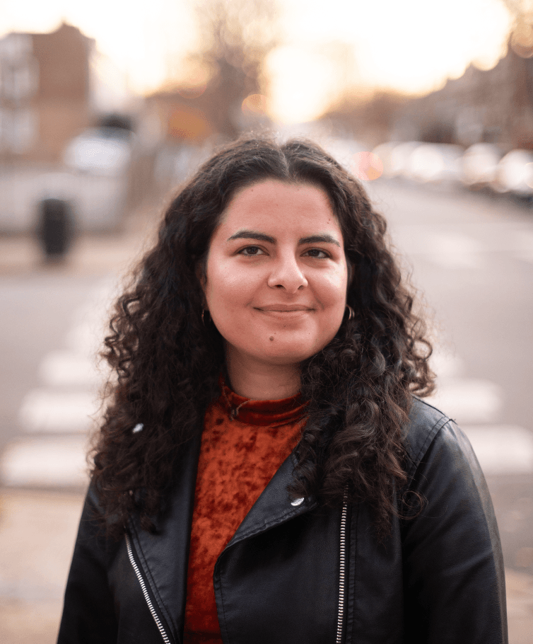 Headshot of Parshya Kavoosi.