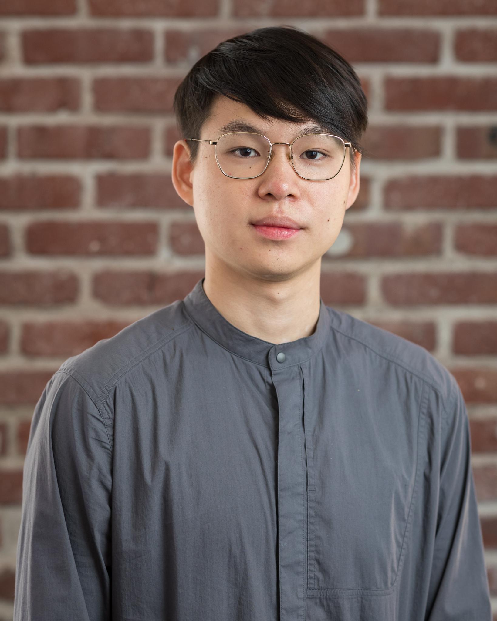 Headshot of Jinglun Yu.