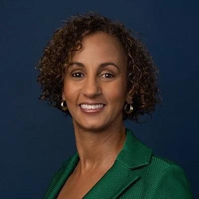 Headshot of Leslie Boissiere, vice president of external affairs at Annie E. Casey Foundation, in a green jacket.