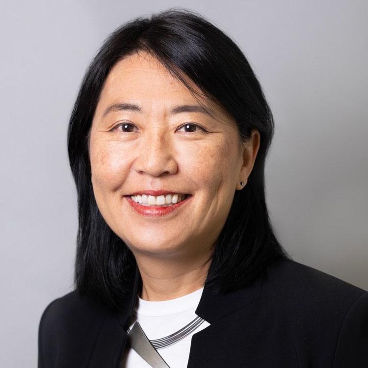 Mari Kuraishi, president of the Jessie Ball duPont Fund, in a black jacket.