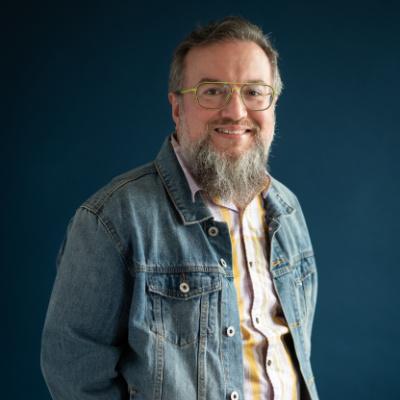 Headshot of Justin Christy.