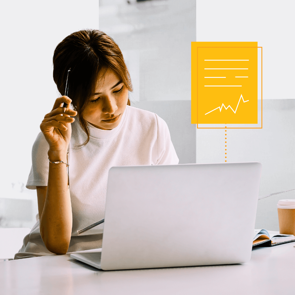 A woman reading an online document.
