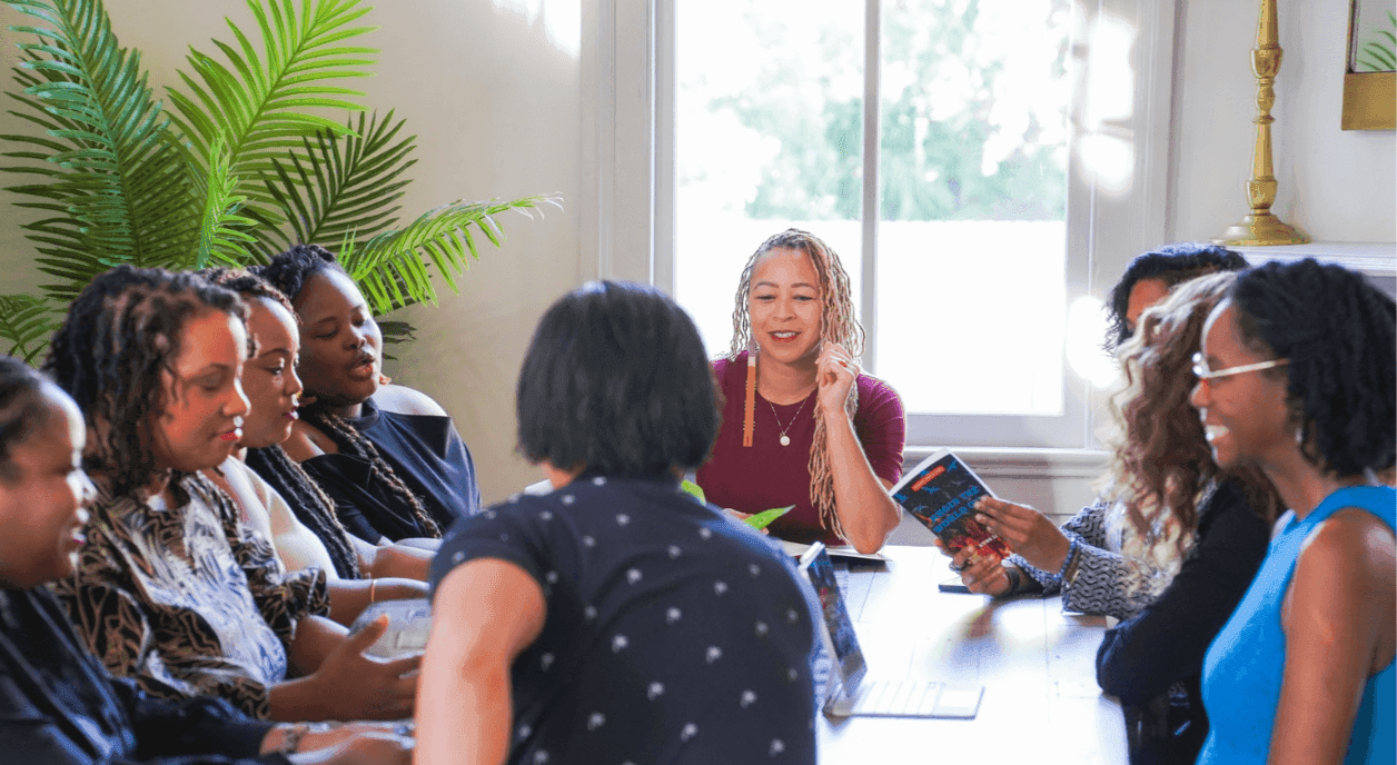 A group of women meeting to evaluate their nonprofit program.