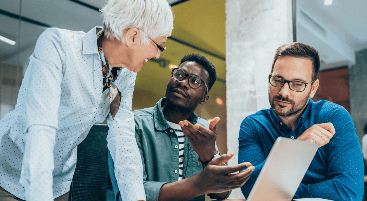 Three nonprofit leaders having a conversation.