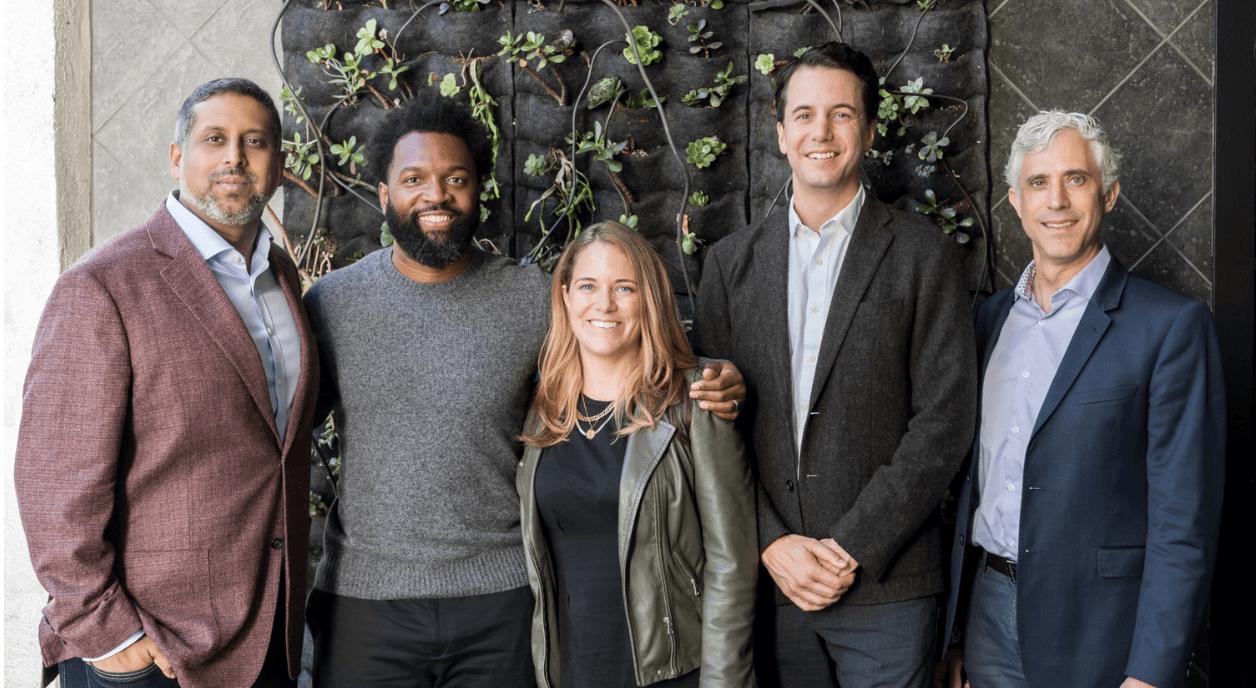 Authors of this article standing with colleagues.