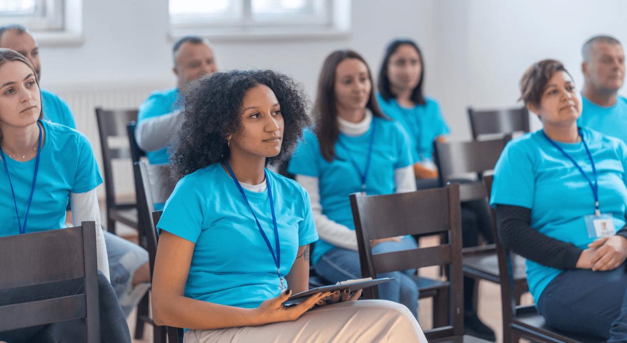 Group of corporate volunteers at a meeting.