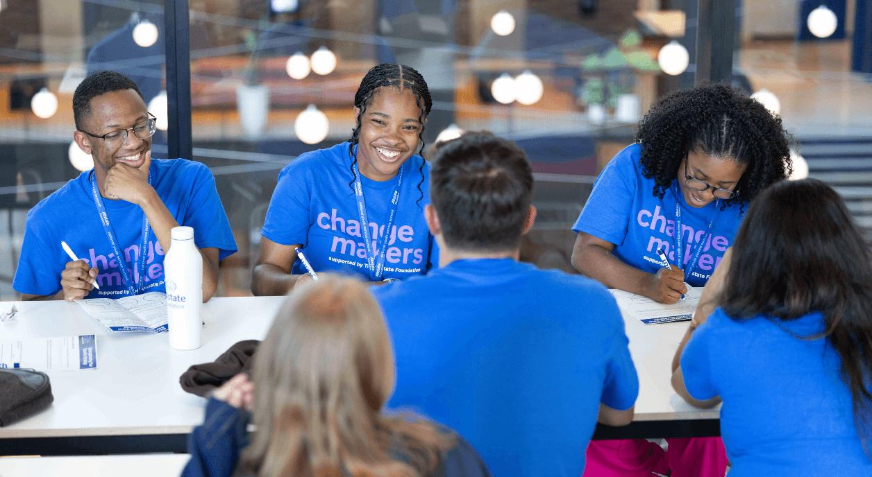 A group of young people doing nonprofit work.