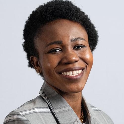 Mantin Diomande, senior research analyst, Candid, in a gray jacket.