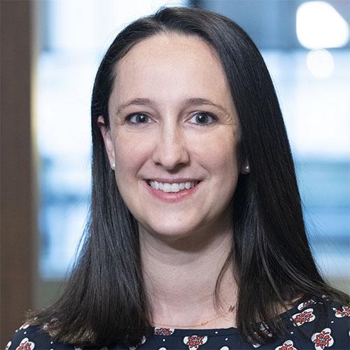 Headshot of Mariah Collins, partner, Boston, of the Bridgespan Group, in a patterned top.