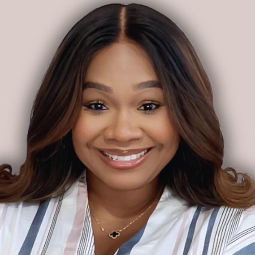 Headshot of Mercedes Brown, Director of Race Equity Assessment, Building Movement Project, in a striped shirt.