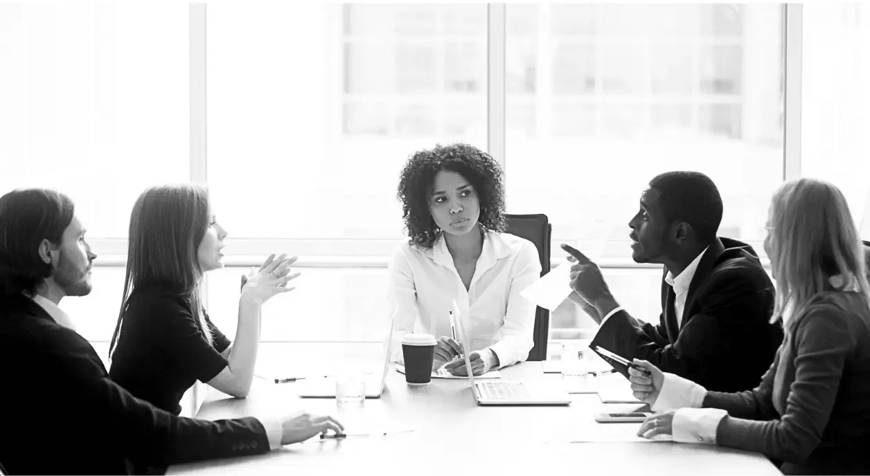 A group of colleagues discussing DEI culture change.