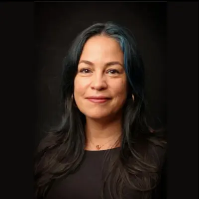 Headshot of Lourdes J. Rodríguez, CEO, David Rockefeller Fund, in a black top.