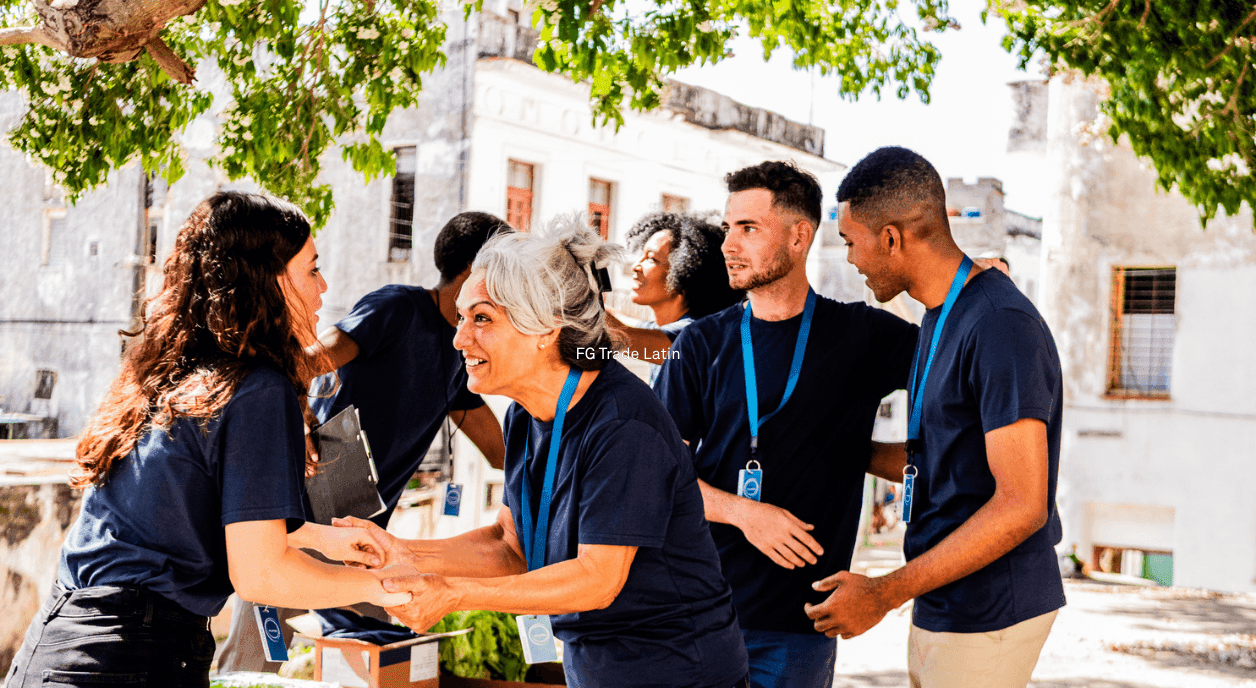 A group of volunteers and nonprofit staff outside.